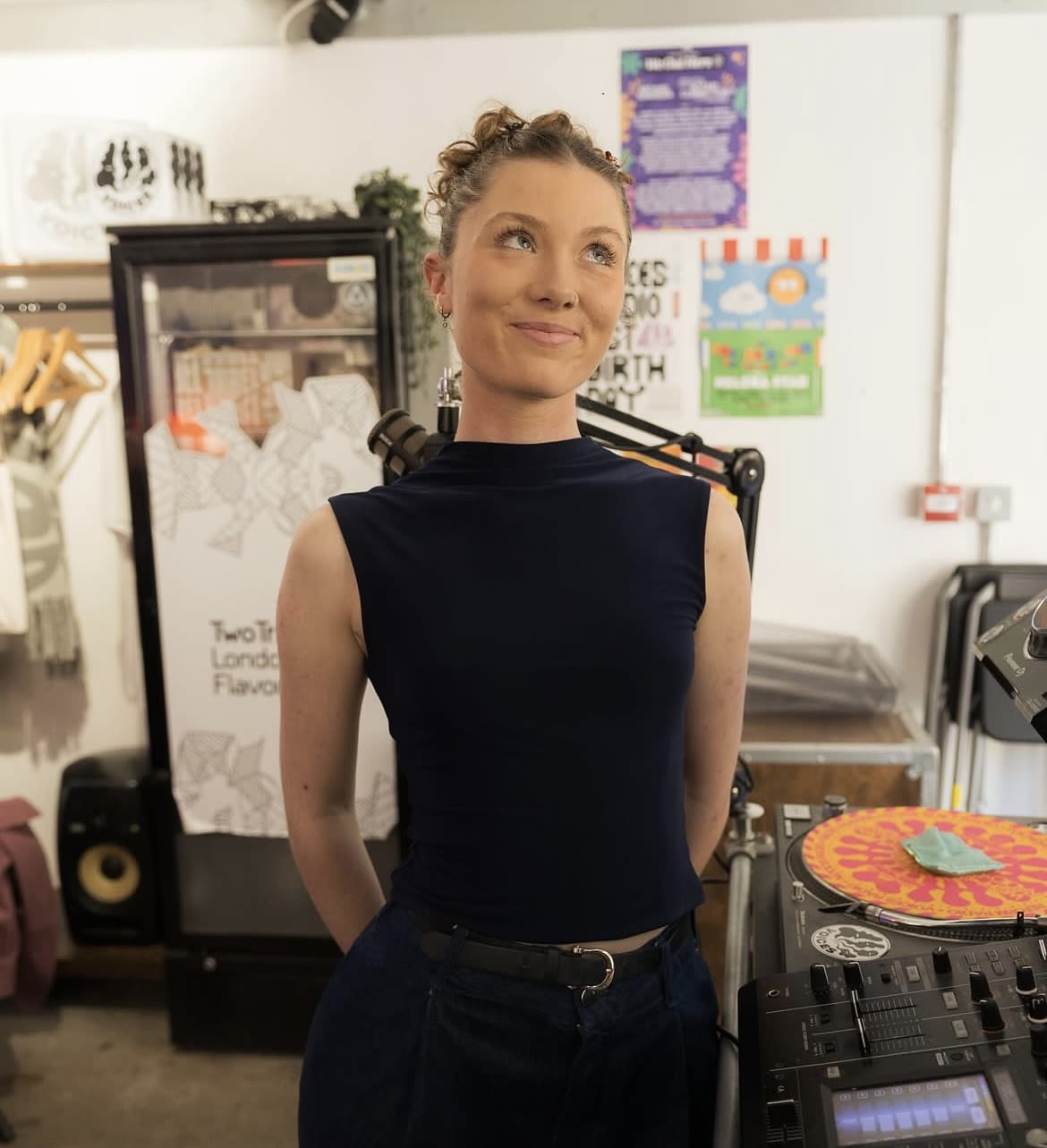 two black headphones on brown wooden table